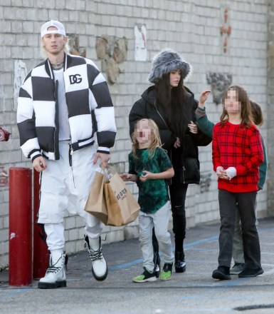 Malibu, CA  - *EXCLUSIVE* Machine Gun Kelly and Megan Fox take her kids and her mother Gloria Darlene Fox Christmas shopping at One Gun Ranch store at The Malibu Pier in Malibu.

Pictured: Machine Gun Kelly, Megan Fox

BACKGRID USA 21 DECEMBER 2022 

BYLINE MUST READ: RMBI / BACKGRID

USA: +1 310 798 9111 / usasales@backgrid.com

UK: +44 208 344 2007 / uksales@backgrid.com

*UK Clients - Pictures Containing Children
Please Pixelate Face Prior To Publication*