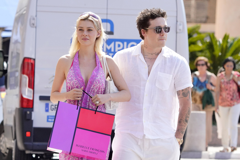 EXCLUSIVE: Brooklyn Beckham and his wife Nicola Peltz continue their honeymoon having lunch at the Club 55 in St-Tropez. 30 Jun 2022 Pictured: Brooklyn Beckham and his wife Nicola Peltz. Photo credit: EliotPress / MEGA TheMegaAgency.com +1 888 505 6342 (Mega Agency TagID: MEGA873615_012.jpg) [Photo via Mega Agency]