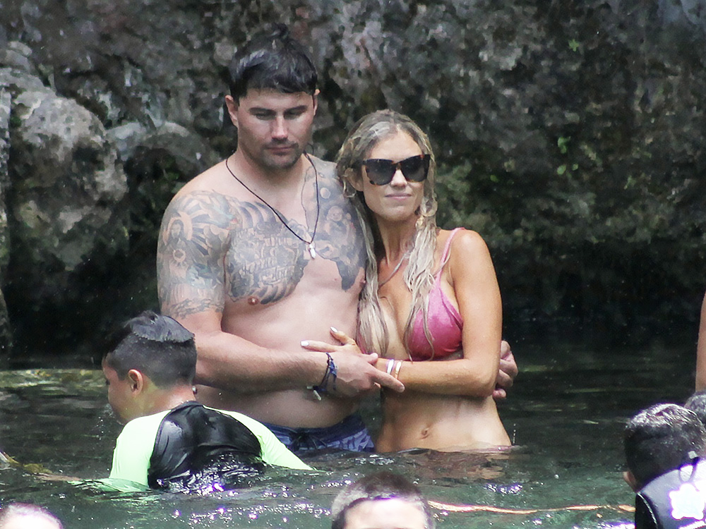 Flip or Flop star Christina Haack looks stunning in a pink bikini as she visits a natural swimming hole in Mexico with new boyfriend Joshua Hall.