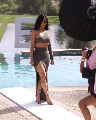 EXCLUSIVE: Kim Kardashian is seen at the 2022 Revolve Festival. 17 Apr 2022 Pictured: Kim Kardashian is seen at the 2022 Revolve Festival. Photo credit: MEGA TheMegaAgency.com +1 888 505 6342 (Mega Agency TagID: MEGA849051_003.jpg) [Photo via Mega Agency]