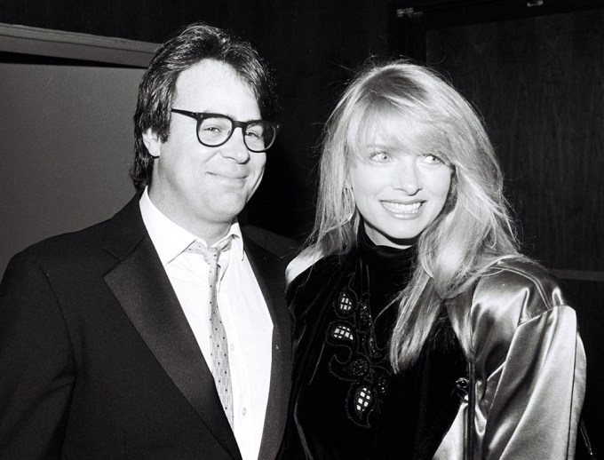 Dan Aykroyd & Donna Dixon pose