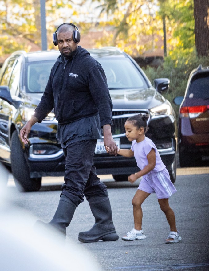 Kanye West With His Daughter Chicago at North’s Game