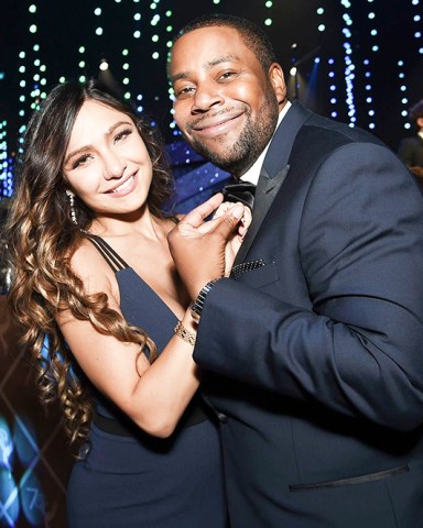 Christina Evangeline, Kenan Thompson. Christina Evangeline, left, and Kenan Thompson attend the Governors Ball during night two of the Television Academy's 2018 Creative Arts Emmy Awards at the Microsoft Theater, in Los Angeles
2018 Creative Arts Emmy Awards - Governors Ball - Night Two, Los Angeles, USA - 09 Sep 2018