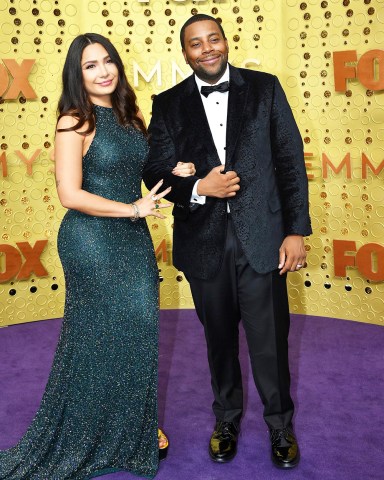 Kenan Thompson, Christina Evangeline. Christina Evangeline, left, and Kenan Thompson arrive at the 71st Primetime Emmy Awards, at the Microsoft Theater in Los Angeles
71st Primetime Emmy Awards - Arrivals, Los Angeles, USA - 22 Sep 2019