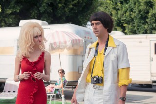 ANGELYNE -- "Glow in the Dark Queen of the Universe" Episode 104 -- Pictured: (l-r) Emmy Rossum as Angelyne, Hamish Linklater as Rick Kraus -- (Photo by: Isabella Vosmikova/Peacock)