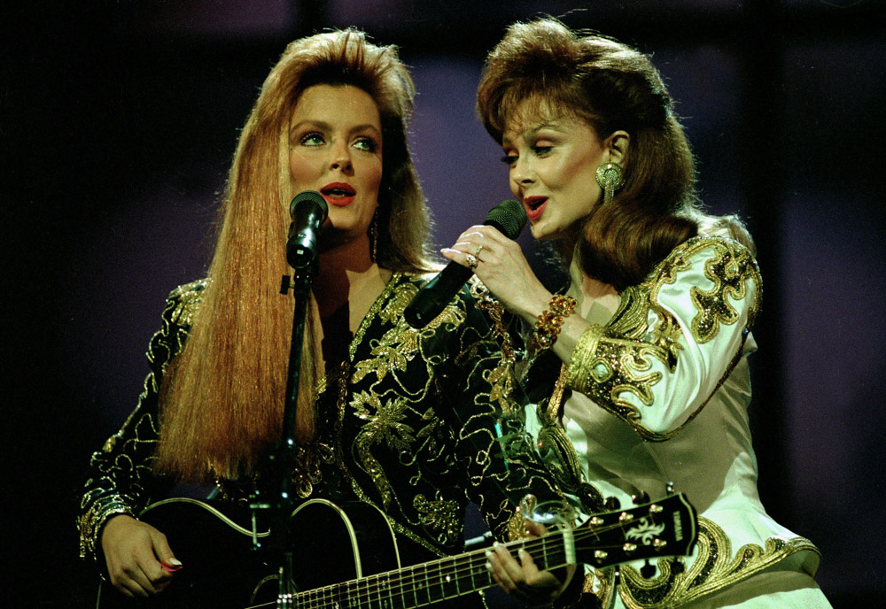 Judd Wynonna Judd, left, and her mother, Naomi, perform during the Country Music Association awards show in Nashville, Tenn., . The Judds took home the award for duo of the year
WYNONNA NAOMI JUDD