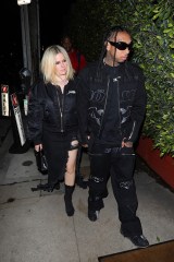 Santa Monica, CA  - *EXCLUSIVE*  - Avril Lavigne, 38, and rapper boyfriend Tyga, 33, confirm dating rumors as they are seen lovingly holding hands as they are seen heading to Italian restaurant Giorgio Baldi for a romantic dinner date in Santa Monica.

Pictured: Avril Lavigne, Tyga

BACKGRID USA 9 MARCH 2023 

BYLINE MUST READ: TPG / BACKGRID

USA: +1 310 798 9111 / usasales@backgrid.com

UK: +44 208 344 2007 / uksales@backgrid.com

*UK Clients - Pictures Containing Children
Please Pixelate Face Prior To Publication*