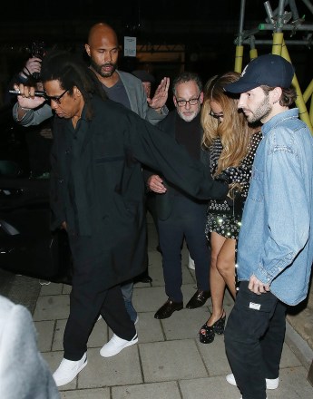 London, UNITED KINGDOM  - *EXCLUSIVE*  - Jay Z and Beyoncé make a stylish exit from Harry's Bar in Mayfair, accompanied by tight security, as billionaire businessman and Aston Villa FC chairman Nassef Sawiris joins the power couple. Inside sources reveal that Beyoncé indulged in a delectable soufflé during their visit.

Pictured: Jay Z, Beyonce Knowles

BACKGRID USA 19 MAY 2023 

BYLINE MUST READ: Click News and Media / BACKGRID

USA: +1 310 798 9111 / usasales@backgrid.com

UK: +44 208 344 2007 / uksales@backgrid.com

*UK Clients - Pictures Containing Children
Please Pixelate Face Prior To Publication*