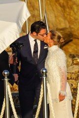 Blushing bride Sofia Richie looks radiant in an elegant white gown as she celebrates her lavish wedding weekend in the French Riviera. The model and daughter of legendary crooner Lionel Richie stepped out with her British fiance Elliot Grainge on Friday evening during their ultra glamorous trip to tie the knot in Antibes. It was unclear whether the happy couple were heading off to a fancy rehearsal dinner, or were dressed up for the nuptials. The stylish 24-year-old chose a demure, delicately beaded floor length ensemble for the occasion paired with white stilettos and wore her long hair in a chic up do. Her record executive groom, 30, looked dapper in a dark suit and tie as they were snapped by their team of photographers at their swanky hotel at sunset. Among the slew of A-list guests jetting in to watch them exchange vows are Cameron Diaz and Benji Madden, Sofia’s sister Nicole Richie and husband Joel Madden, as well as her father Lionel Richie and brother Miles. 21 Apr 2023 Pictured: Sofia Richie , Elliot Grainge. Photo credit: EliotPress / MEGA TheMegaAgency.com +1 888 505 6342 (Mega Agency TagID: MEGA971732_001.jpg) [Photo via Mega Agency]