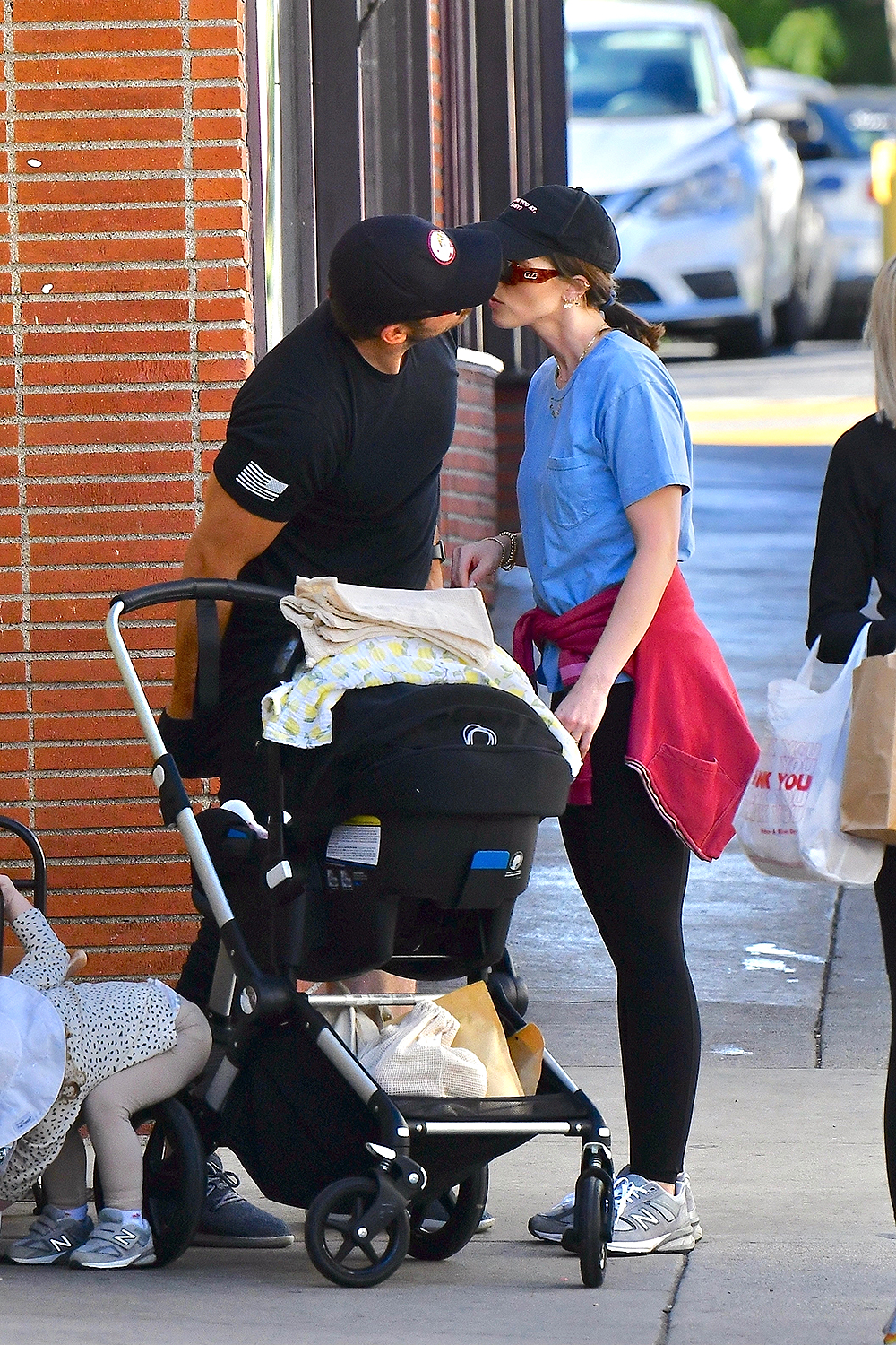 *EXCLUSIVE* Katherine Schwarzenegger and Chris Pratt share a smooch at the Farmer's Market