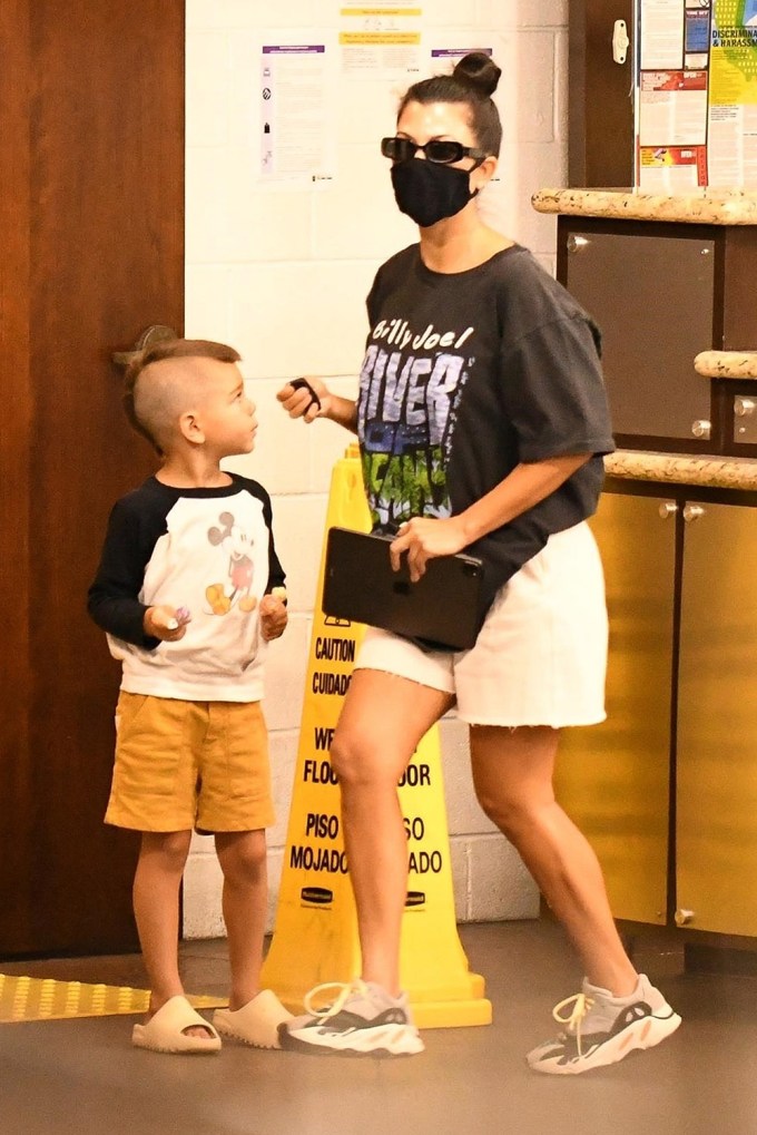 Kourtney Kardashian In Baggy Shorts