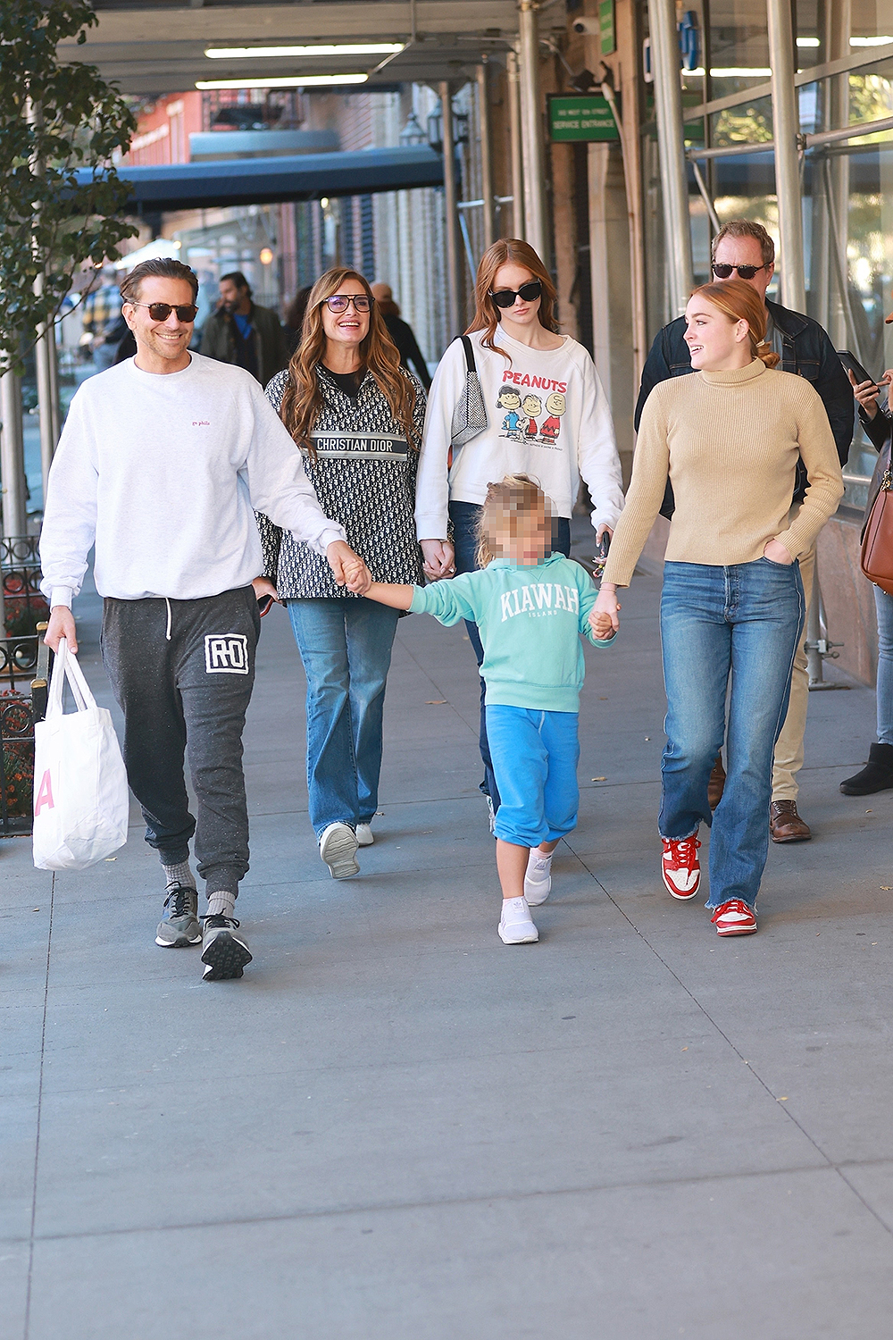 Bradley Cooper has lunch with Brooke Shields and Chris Henchy and their family at Café Cluny