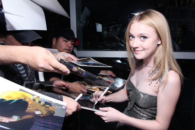 Dakota Fanning Signs Autographs at the Premiere of ‘The Runaways’