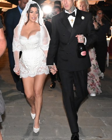 Portofino, ITALY - Kourtney Kardashian and Travis Barker get married in Portofino.Pictured: Kourtney Kardashian, Travis BarkerBACKGRID USA 22 MAY 2022 BYLINE MUST READ: Cobra Team / BACKGRIDUSA: +1 310 798 9111 / usasales@backgrid.comUK: +44 208 344 2007 / uksales@backgrid.com*UK Clients - Pictures Containing ChildrenPlease Pixelate Face Prior To Publication*