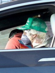 Malibu, CA  - *EXCLUSIVE*  - Lady Gaga and boyfriend Michael Polansky pick up his car that was parked on PCH in Malibu. The pop star wore a green cap over her hair which appeared to have been chopped down just beneath her ear  with a strand of hair left long to her shoulders.

Pictured: Lady Gaga, Michael Polansky

BACKGRID USA 10 MAY 2022 

BYLINE MUST READ: RMBI / BACKGRID

USA: +1 310 798 9111 / usasales@backgrid.com

UK: +44 208 344 2007 / uksales@backgrid.com

*UK Clients - Pictures Containing Children
Please Pixelate Face Prior To Publication*