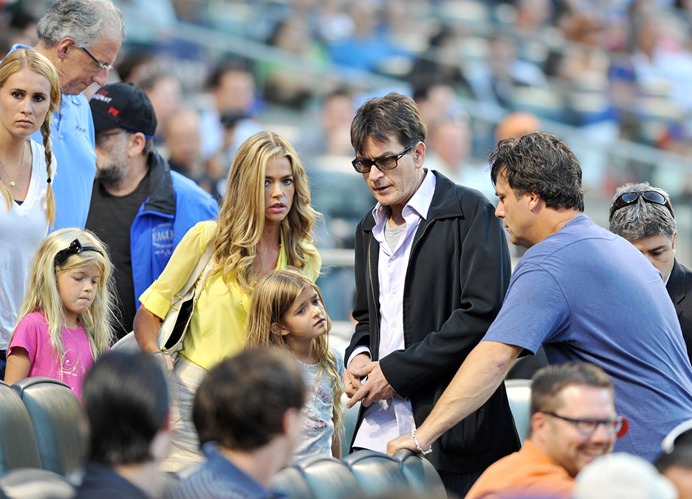 CHARLIE SHEEN AND DENISE RICHARDS AT A METS GAME