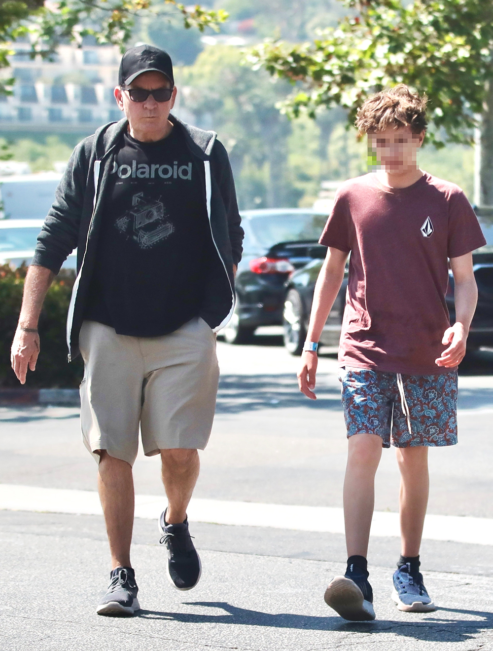 Malibu, CA  - *EXCLUSIVE*  - Charlie Sheen shopping with his twin son at a surf store and enjoying lunch together at Subway in Malibu.

Pictured: Charlie Sheen

BACKGRID USA 25 JULY 2023 

BYLINE MUST READ: @MALIBUUSTARS YOUTUBE / BACKGRID

USA: +1 310 798 9111 / usasales@backgrid.com

UK: +44 208 344 2007 / uksales@backgrid.com

*UK Clients - Pictures Containing Children
Please Pixelate Face Prior To Publication*