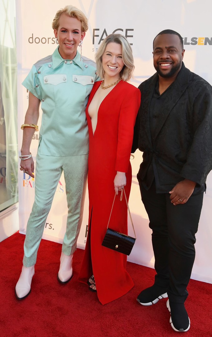 Media personality Derek Warburton greets M’lisa and Royal Ellis from RME Consulting Group