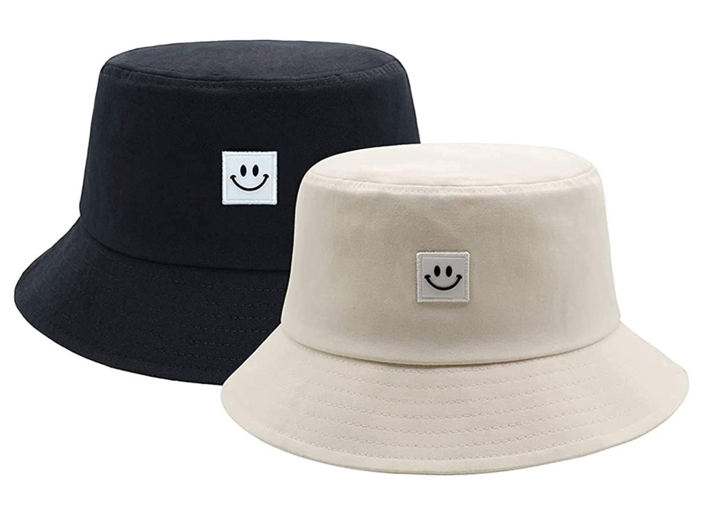 One black and one khaki bucket hat set on a white background.