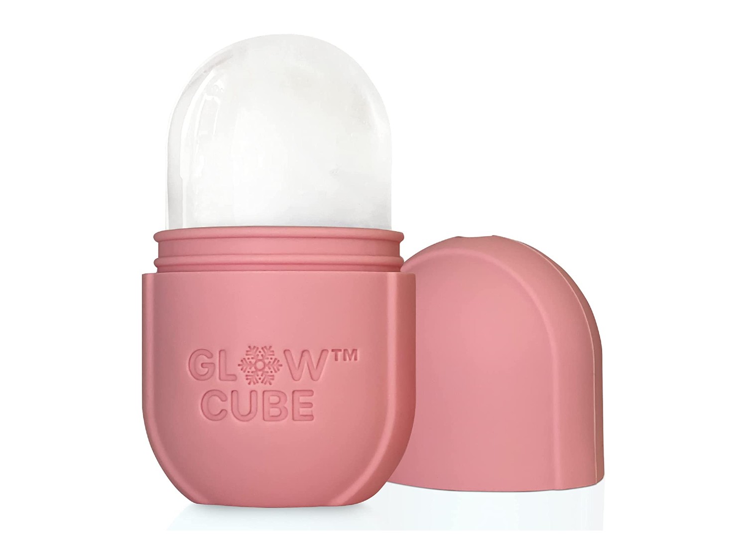 A pastel pink Glow Cube Ice Roller on a white background