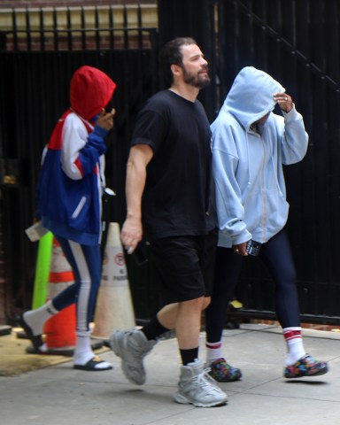 New York, NY - As Madonna heals, her twin daughters ( in Hoodies)Stella and Estere and her son David Banda stay close by. Kabbalah rabbis with prayer books also came by. Flowers sent. And Fans from Italy took selfies in front of her place Pictured: Madonna, David Banda, Stella, Estere BACKGRID USA 1 JULY 2023 BYLINE MUST READ: Diane Cohen / BACKGRID USA: +1 310 798 9111 / usasales@backgrid.com UK: +44 208 344 2007 / uksales@backgrid.com *UK Clients - Pictures Containing Children Please Pixelate Face Prior To Publication*