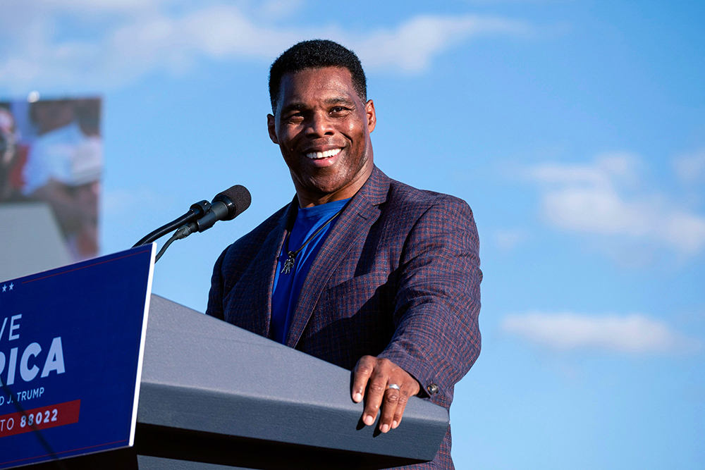 Senate candidate Herschel Walker speaks during former President Donald Trump's Save America rally in Perry, Ga. Senate Minority Leader Mitch McConnell on Wednesday, Oct. 27, endorsed Herschel Walker's Republican primary bid for a Senate seat in Georgia
Election 2022 Senate Georgia, Perry, United States - 25 Sep 2021