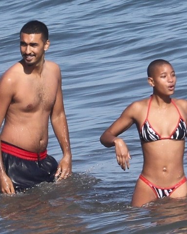 *EXCLUSIVE* Malibu, CA  - Actress and singer Willow Smith and her new male companion share a funny cigarette before cooling off in the ocean together and exchanging phone numbers before going their separate ways.

Pictured: Willow Smith

BACKGRID USA 24 JUNE 2022 

BYLINE MUST READ: RMBI / BACKGRID

USA: +1 310 798 9111 / usasales@backgrid.com

UK: +44 208 344 2007 / uksales@backgrid.com

*UK Clients - Pictures Containing Children
Please Pixelate Face Prior To Publication*