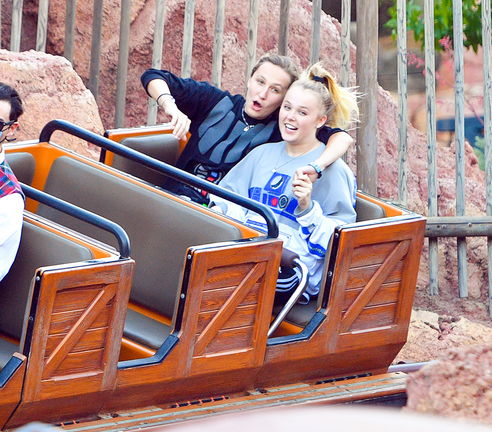 EXCLUSIVE: Jojo Siwa and her girlfriend Kylie Prew go heavy on the PDA while they spend a romantic day at Disneyland