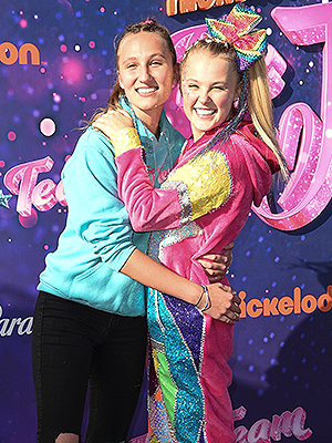 Kylie Prew, left, and JoJo Siwa arrive at the drive-in premiere of JoJo Siwa's "The J Team", at the Rose Bowl in Pasadena, CalifJoJo Siwa's "The J Team" Drive-In Premiere, Pasadena, United States - 03 Sep 2021