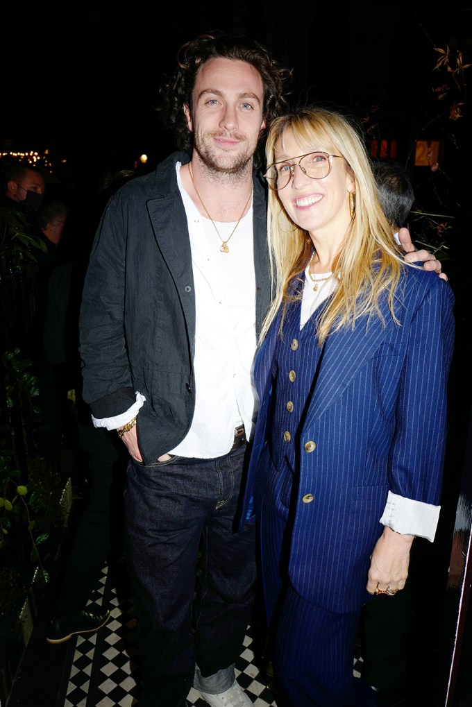 Aaron and Sam Taylor-Johnson at a boutique in London