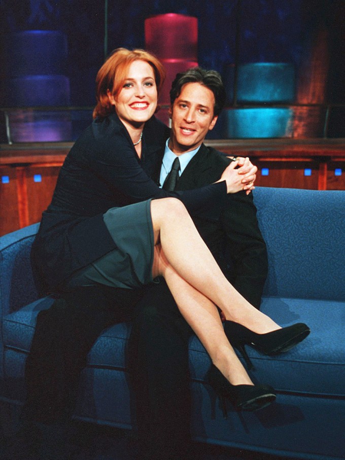 Gillian Anderson Sits On Jon Stewart’s Lap