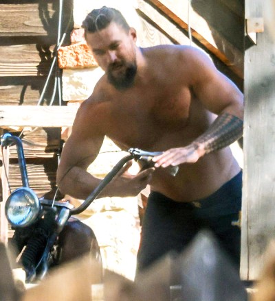 Malibu, CA  - *EXCLUSIVE*  - Actor Jason Momoa goes shirtless as he works on his vintage motorcycles in Malibu. The Aquaman star was seen with his hair pulled backin a pair of shorts and no shirt as he tightened the handlebars on his bike. Jason was recently spotted delivering a Christmas tree to ex Lisa Bonet. According to recent reports Jason is expected to spend part of the holiday together with Lisa with whom he shares 15-year-old daughter Lola and 13-year-old son Nakoa-Wolf.

Pictured: Jason Momoa

BACKGRID USA 22 DECEMBER 2022 

BYLINE MUST READ: RMBI / BACKGRID

USA: +1 310 798 9111 / usasales@backgrid.com

UK: +44 208 344 2007 / uksales@backgrid.com

*UK Clients - Pictures Containing Children
Please Pixelate Face Prior To Publication*