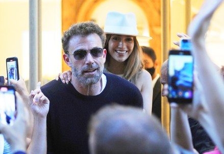 Jennifer Lopez and her husband Ben Affleck arrive by surprise in the late afternoon in the center to do some shopping. With some bodyguards who make room for them among the people they take a short walk, then visit some boutiques, the word of their presence spreads and the crowd becomes huge waiting for them outside Brunello Cuccinelli, so the bodyguards bring a car directly next to the boutique, and so with difficulty Jennifer and Ben Affleck manage to gain entrance to leave immediately.
Jennifer Lopez and Ben Affleck arrive by surprise at Brunello Cucinelli, Milan, Italy - 25 Aug 2022