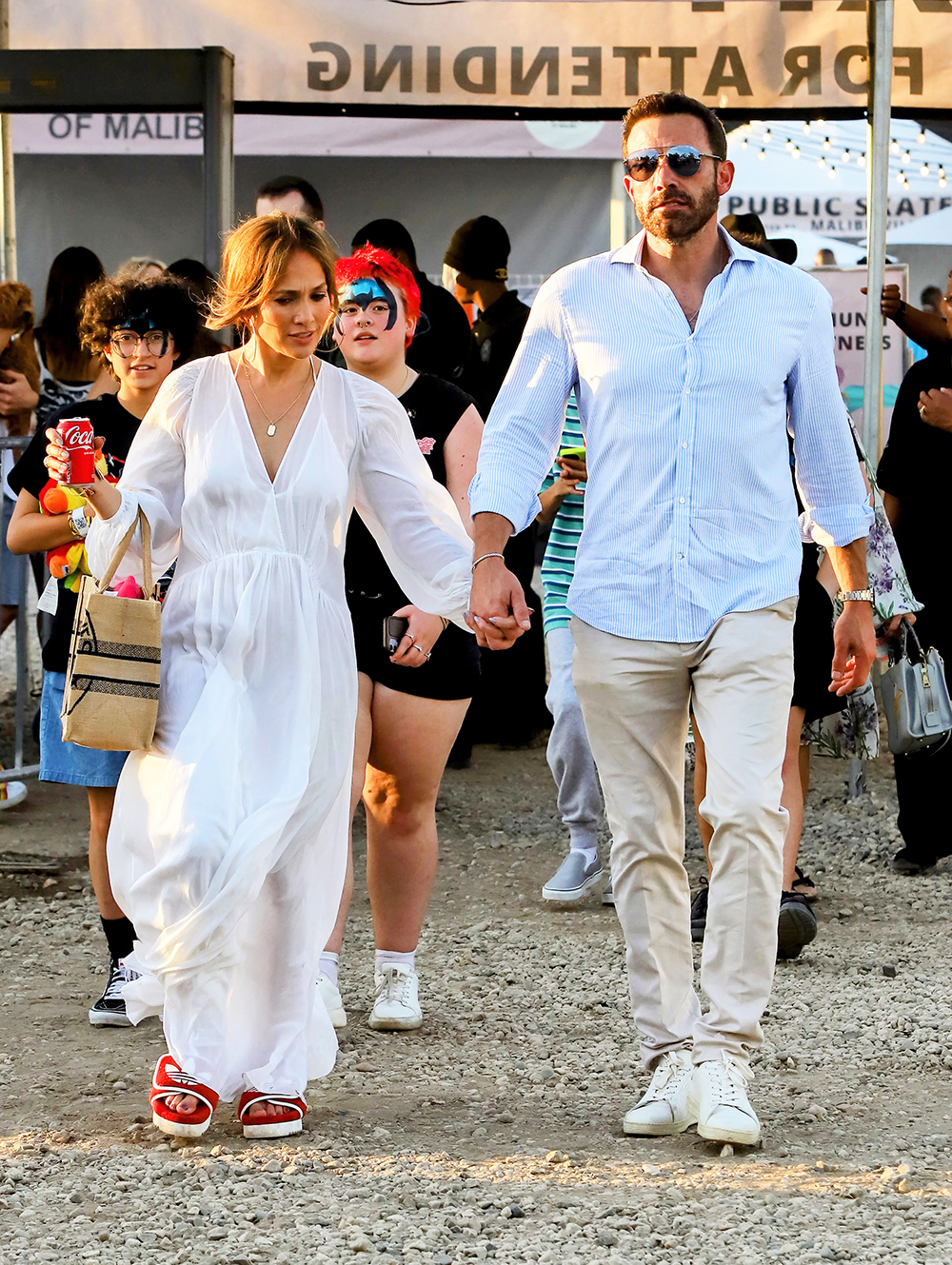 Ben Affleck and Jennifer Lopez are seen leaving the Malibu Chili. 04 Sep 2022 Pictured: Ben Affleck and Jennifer Lopez. Photo credit: APEX / MEGA TheMegaAgency.com +1 888 505 6342 (Mega Agency TagID: MEGA892003_003.jpg) [Photo via Mega Agency]