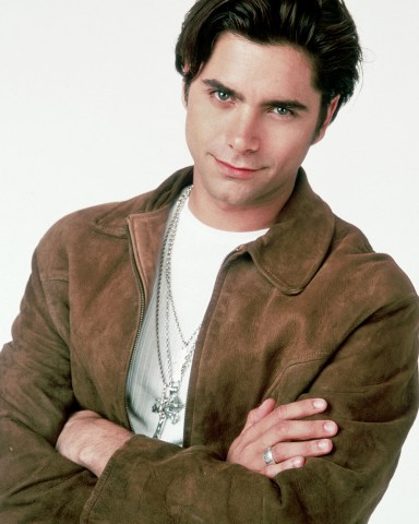 Editorial use only. No book cover usage.Mandatory Credit: Photo by Kobal/Shutterstock (5854362a)John StamosJohn Stamos - 1988Portrait