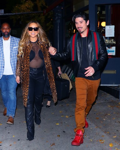 New York, NY  - *EXCLUSIVE*  - Mariah Carey & Brian Tanaka were spotted hand in hand leaving Blue Ribbon Sushi after a random and surprisingly exciting run-in with rapper Lil Durk who hung out with the couple for a while before heading to Teterboro airport. They all took greeted each other, laughed, did shots, and took personal photos before parting ways. **SHOT ON 11/07/2022**

Pictured: Mariah Carey, Brian Tanaka

BACKGRID USA 8 NOVEMBER 2022 

BYLINE MUST READ: BlayzenPhotos / BACKGRID

USA: +1 310 798 9111 / usasales@backgrid.com

UK: +44 208 344 2007 / uksales@backgrid.com

*UK Clients - Pictures Containing Children
Please Pixelate Face Prior To Publication*