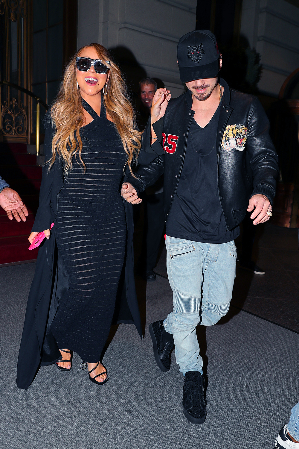 Mariah Carey wore a see-through black dress while leaving with beau Bryan Tanaka The St. Regis New York