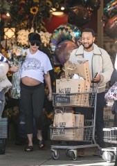 Beverly Hills, CA  - Pregnant Chrissy Teigen and husband John Legend stock up on groceries on Thanksgiving Eve at a Bev Hills grocery store. We catch Chrissy with her pregnant belly on full display as the Versace tee rides up her baby bump. The couple did a handful of shopping leaving the grocery store with two full shopping carts.

Pictured: Chrissy Teigen, John Legend

BACKGRID USA 23 NOVEMBER 2022 

BYLINE MUST READ: SPOT / BACKGRID

USA: +1 310 798 9111 / usasales@backgrid.com

UK: +44 208 344 2007 / uksales@backgrid.com

*UK Clients - Pictures Containing Children
Please Pixelate Face Prior To Publication*