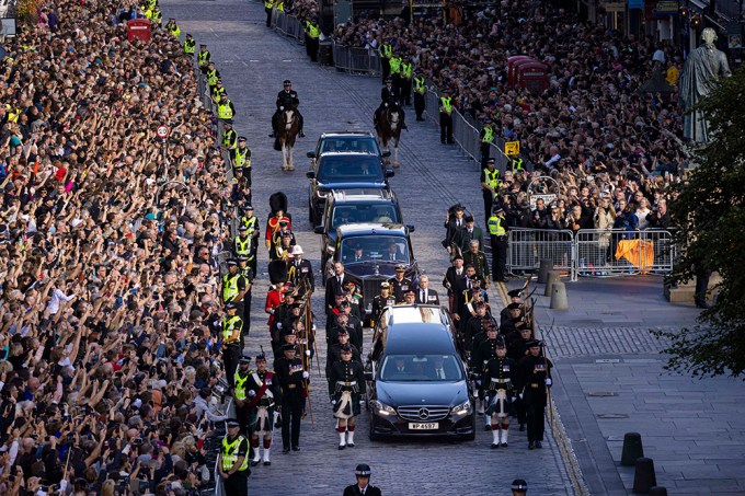 Crowds Watch The Coffin Procession