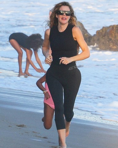 Malibu, CA  - *EXCLUSIVE*  - Keeping up with the Kiddos! Auntie Khloe Kardashian tries to keep up as she spends the day running around and playing with her daughter True Thompson and the Kardashian kids at Malibu beach. Khloe showed off her very thin frame in a pair of black leggings and black sleeveless top for the outing.

Pictured: Khloe Kardashian

BACKGRID USA 6 SEPTEMBER 2022 

USA: +1 310 798 9111 / usasales@backgrid.com

UK: +44 208 344 2007 / uksales@backgrid.com

*UK Clients - Pictures Containing Children
Please Pixelate Face Prior To Publication*