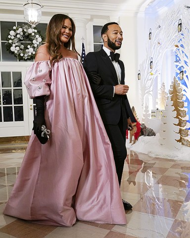 Chrissy Teigen, left, and John Legend arrive for the State Dinner with President Joe Biden and French President Emmanuel Macron at the White House in Washington
France, Washington, United States - 01 Dec 2022