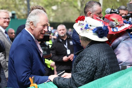 King Charles III shakes members of the public's hands as he did an impromptu walkabout on The Mall the day before his Coronation in London on Friday, May 05, 2023.Thousands of people from around the world are expected to arrive in London for the Coronation over the next few days.
King Charles III Coronation Preparations, London, England - 05 May 2023