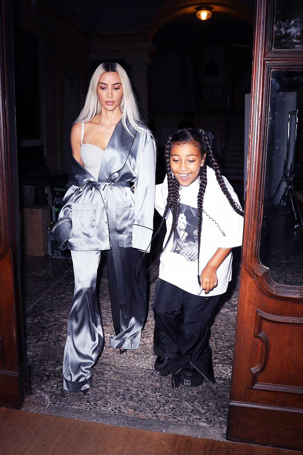 *EXCLUSIVE* Kim Kardashian slays in an off-the-shoulder look as she exits photo shoot with daughter North West