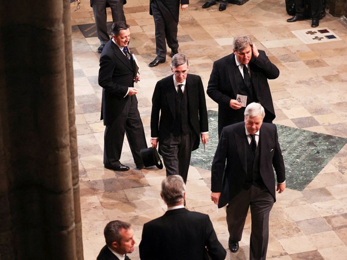 Guests Arriving To The Funeral