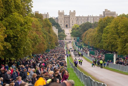 Mourners line the route of Queen Elizabeth II's funeral procession on the Long Walk at Windsor Castle, Britain, 19 September 2022. The late Queen Elizabeth II will be buried inside the King George VI Memorial Chapel within St George's Chapel at Windsor alongside her late husband the Duke of Edinburgh. Britain's Queen Elizabeth II died at her Scottish estate, Balmoral Castle, on 08 September 2022. The 96-year-old Queen was the longest-reigning monarch in British history.
The Funeral of Queen Elizabeth II, Windsor, United Kingdom - 19 Sep 2022