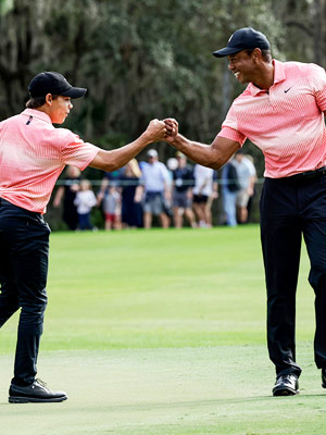 Charlie Woods and Tiger Woods