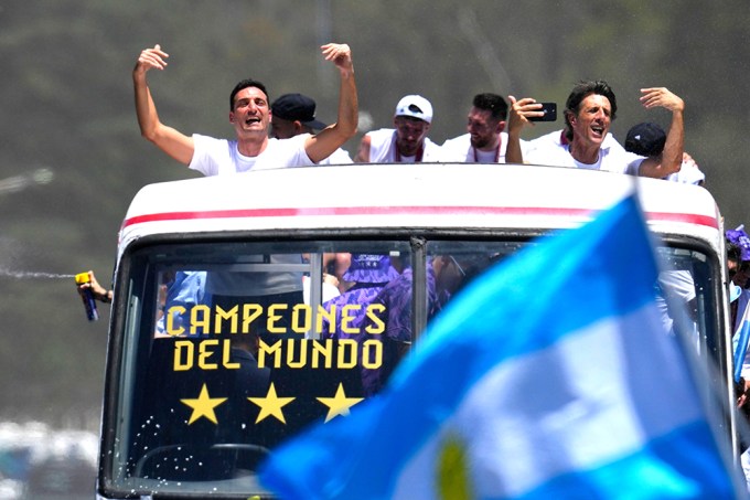 Players Wave From Their Bus