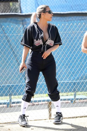 Calabasas, CA  - *EXCLUSIVE*  - Kim, Khloe and Kourtney Kardashian are joined by Kris and Kendall Jenner for a game of softball in Calabasas with friends. The Kardashian clan gathers for pictures after the game with Jonathan Cheban, Corey Gamble and Moises Arias. The ladies got some expert coaching advice from former Yankee Alex Rodriguez. Kim left her Calabasas Peaches Jersey unbuttoned enough to show off some cleavage.

Pictured: Kim Kardashian

BACKGRID USA 8 MARCH 2018 

BYLINE MUST READ: BAHE / BACKGRID

USA: +1 310 798 9111 / usasales@backgrid.com

UK: +44 208 344 2007 / uksales@backgrid.com

*UK Clients - Pictures Containing Children
Please Pixelate Face Prior To Publication*