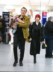 New York, NY  - Nicolas Cage with his daughter August and wife Riko Shibata arrive at JFK airport in NYC.

Pictured: Nicolas Cage

BACKGRID USA 25 MARCH 2023 

USA: +1 310 798 9111 / usasales@backgrid.com

UK: +44 208 344 2007 / uksales@backgrid.com

*UK Clients - Pictures Containing Children
Please Pixelate Face Prior To Publication*