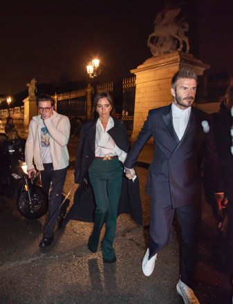 David, Victoria and Brooklyn Beckham leaving the Dior Homme Menswear Fall/Winter 2020-2021 show as part of Paris Fashion Week on January 17, 2020 in Paris, France. 17 Jan 2020 Pictured: David, Victoria and Brooklyn Beckham. Photo credit: KCS Presse / MEGA TheMegaAgency.com +1 888 505 6342 (Mega Agency TagID: MEGA587497_002.jpg) [Photo via Mega Agency]